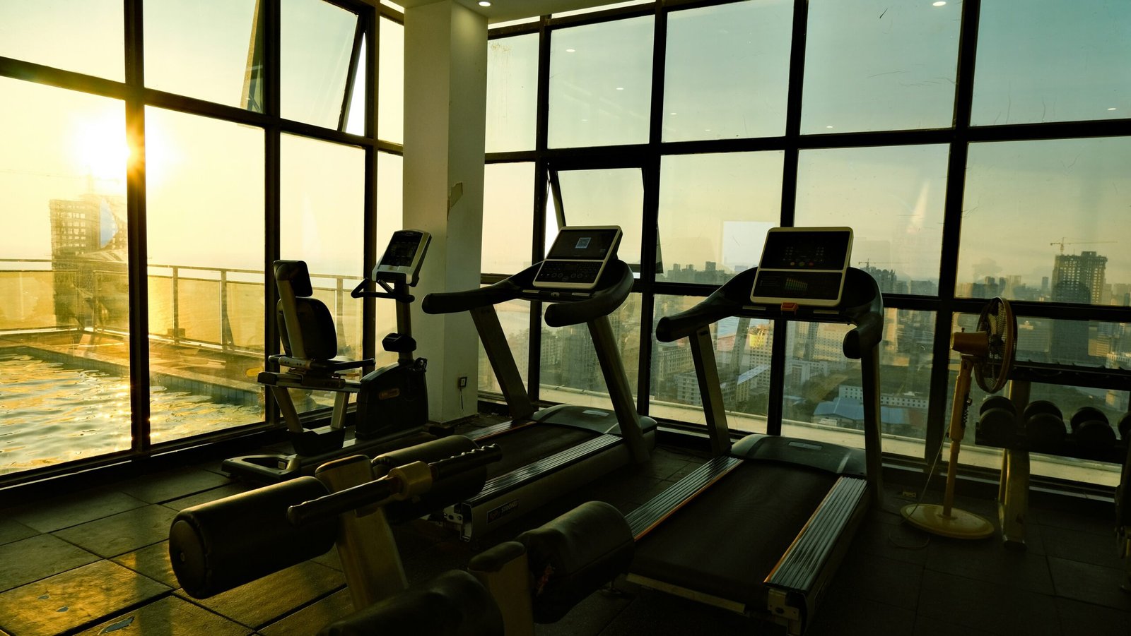 a gym with a view of the city