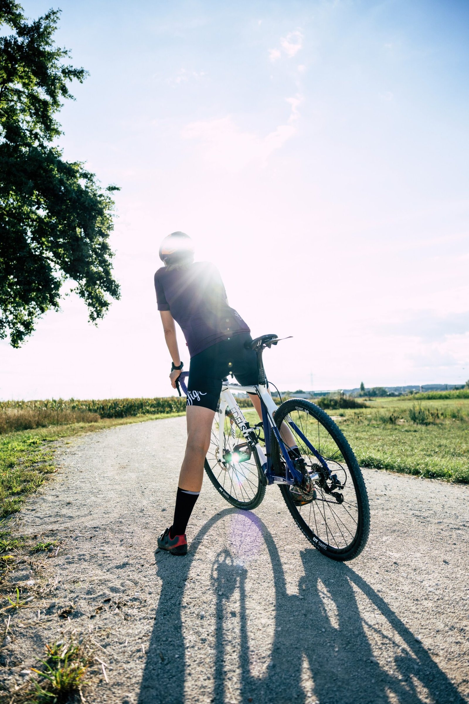 a man riding a bicycle on a road